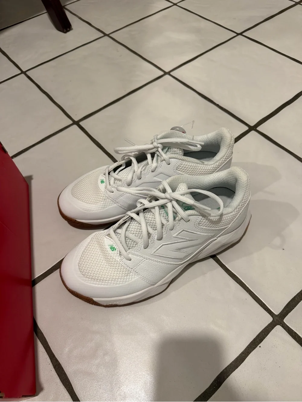 New Balance White Athletic Sneakers with Green Accents and Gum Outsole